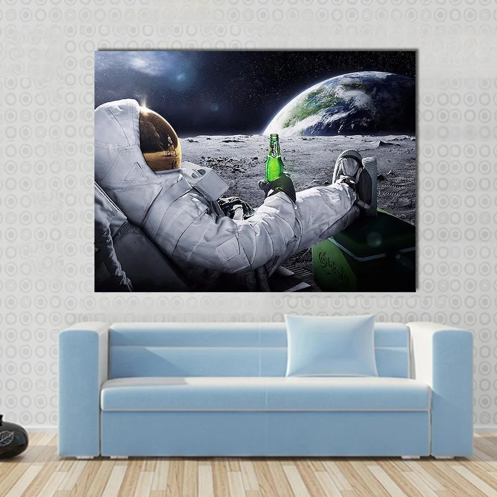 Astronaut Sitting On The Moon Canvas Wall Art