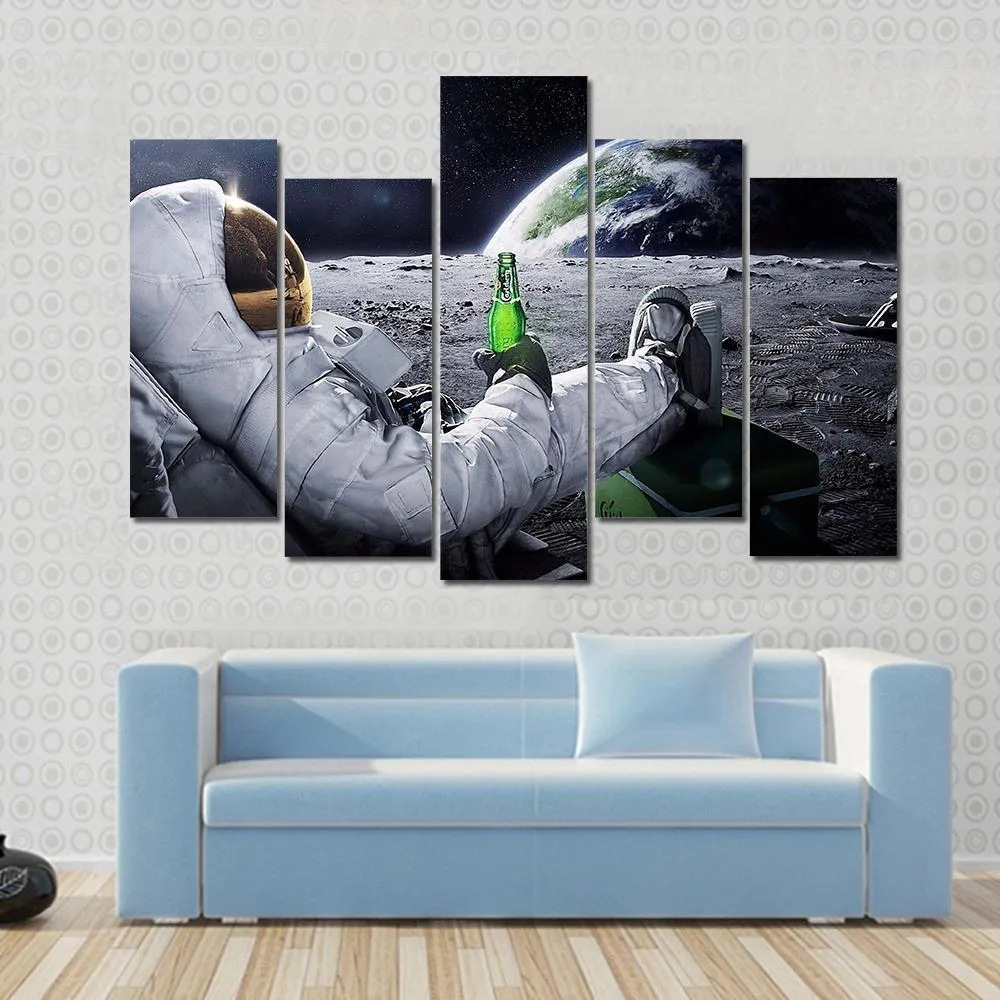 Astronaut Sitting On The Moon Canvas Wall Art