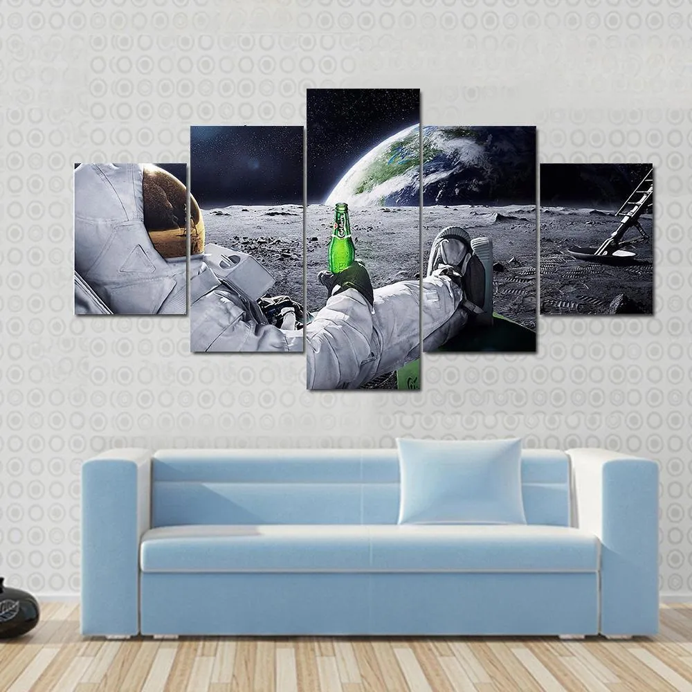 Astronaut Sitting On The Moon Canvas Wall Art