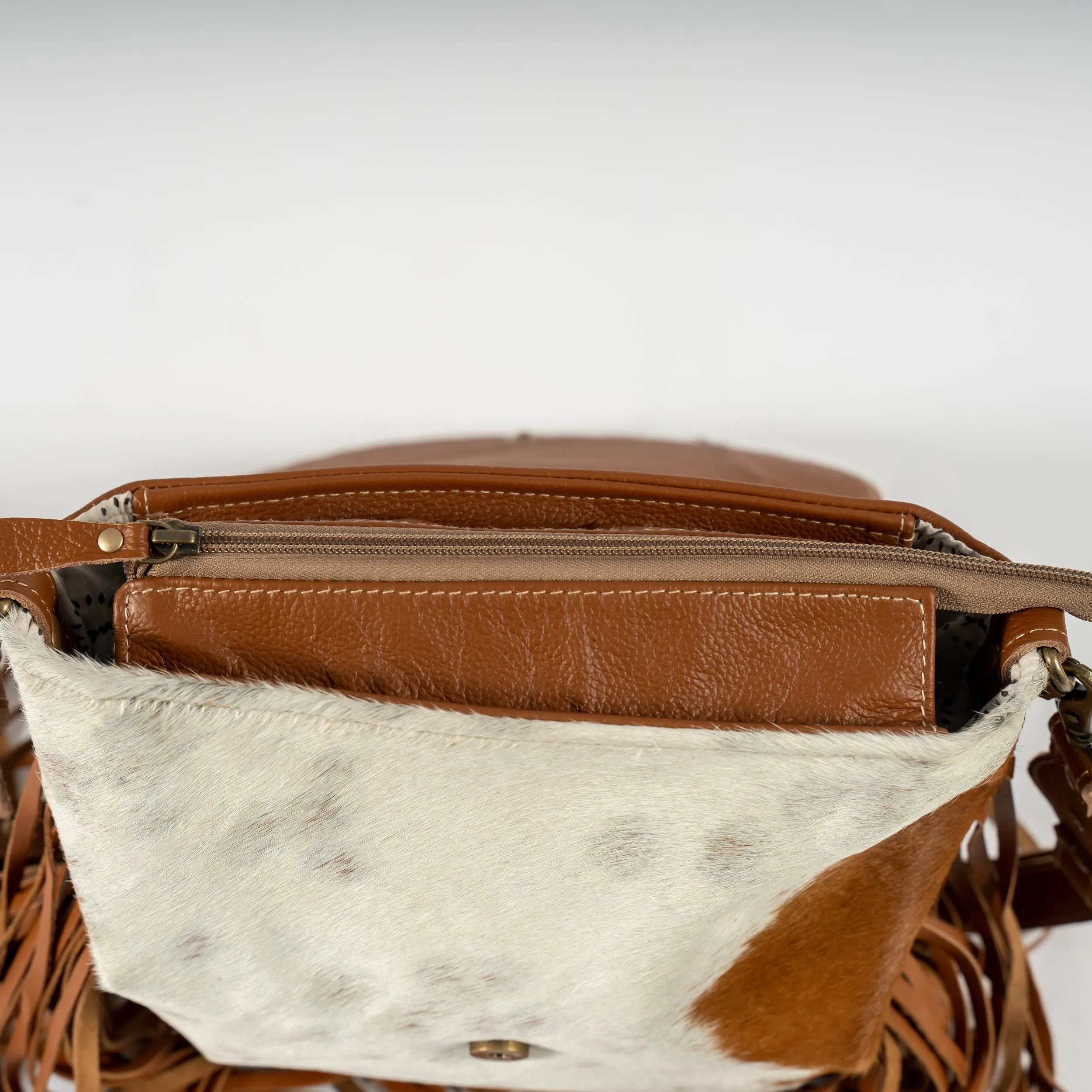 Cowhide and Fringe Hand-Tooled Purse