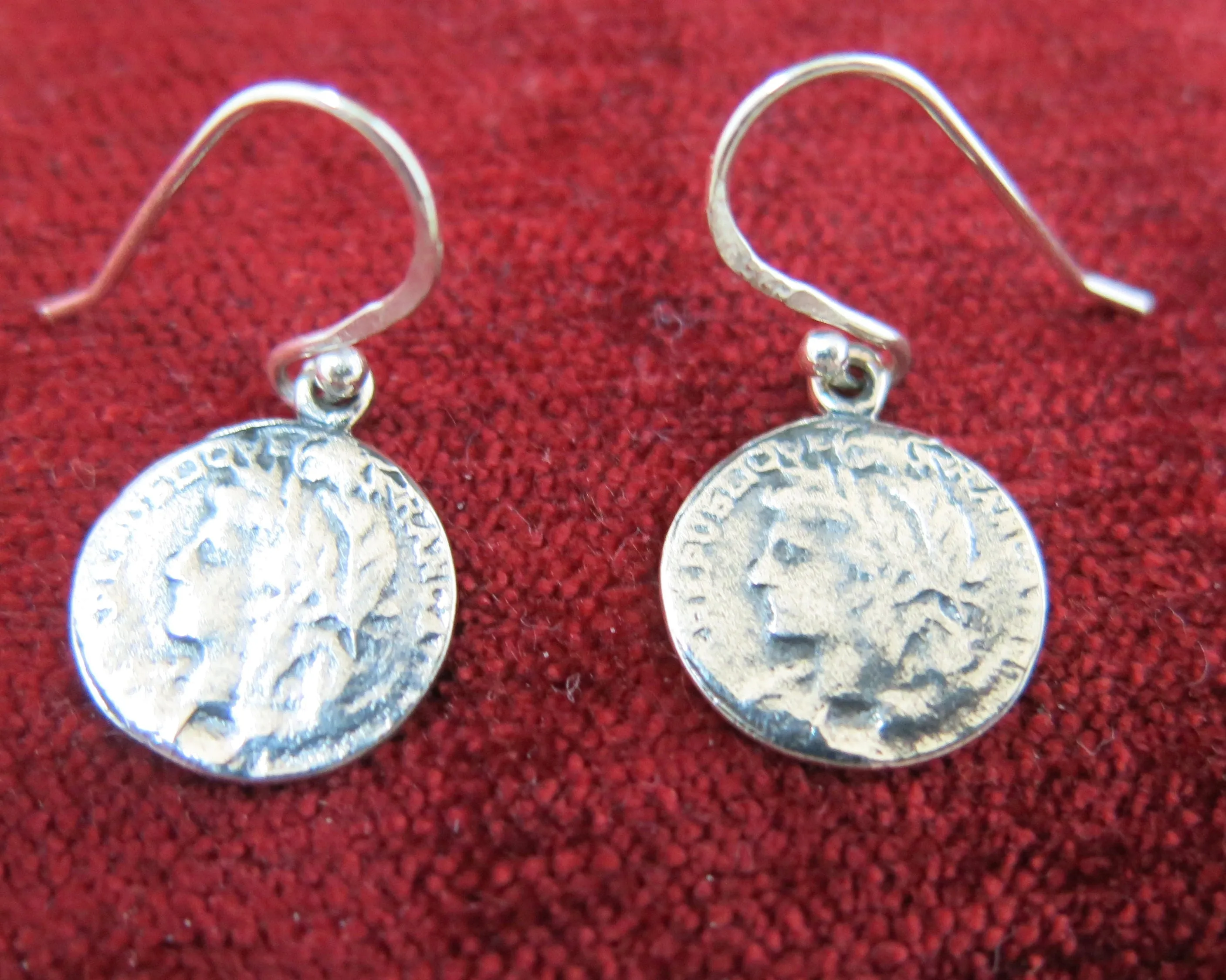 Silver coin design drop earrings