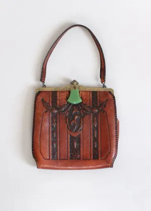 Exquisite 1920s Meeker Vintage Purse with Intricate Tooled Leather Design and Ornate Celluloid Clasp